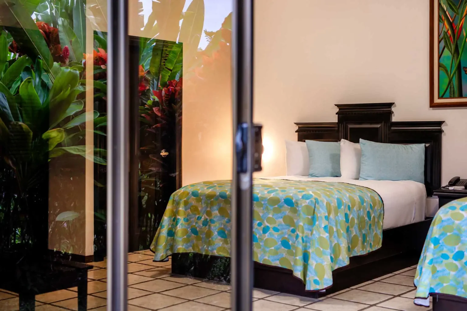 Junior suite with 2 Queen beds and garden view in Arenal Manoa Hot Springs Resort
